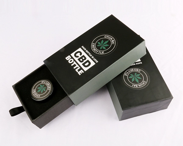 sleek black drawer style cannabis and cbd packaging